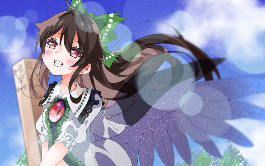 1girl arm_cannon blurry blush bow cape day depth_of_field feathered_wings frilled_shirt_collar frills grin hair_between_eyes hair_bow highres lens_flare long_hair looking_at_viewer ninniku_sarada outdoors puffy_short_sleeves puffy_sleeves red_eyes reiuji_utsuho shirt short_sleeves sky sleeves_past_elbows smile solo touhou tree upper_body weapon wings