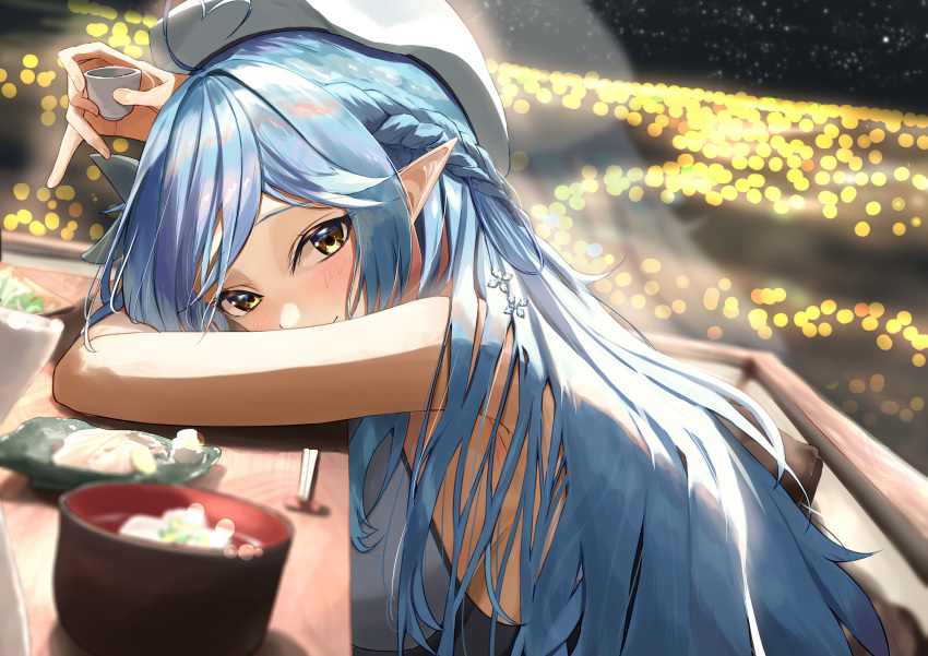 1girl absurdres ahoge bangs bare_arms beret blue_hair blush braid commentary_request cup elf eyebrows_visible_through_hair from_side hat head_rest heart_ahoge highres holding holding_cup hololive long_hair looking_at_viewer looking_to_the_side nayuyu1105 night pointy_ears revision solo upper_body very_long_hair virtual_youtuber white_headwear yellow_eyes yukihana_lamy