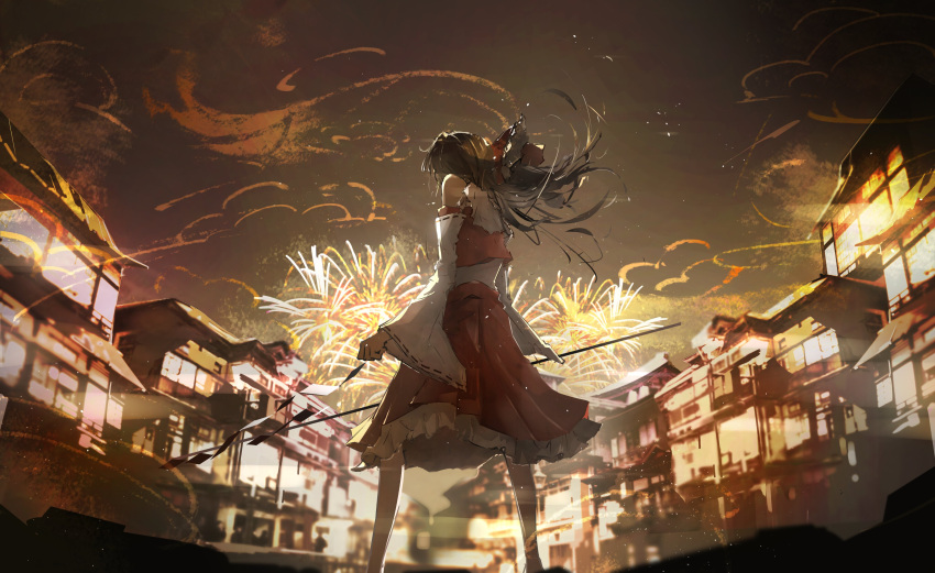 1girl absurdres architecture bare_shoulders bow brown_hair commentary_request detached_sleeves east_asian_architecture feet_out_of_frame fireworks frilled_bow frilled_skirt frills from_behind gohei hair_bow hakurei_reimu highres holding holding_stick hwfdx long_hair looking_away outdoors red_bow red_ribbon red_shorts red_skirt ribbon ribbon-trimmed_sleeves ribbon_trim shirt shorts skirt sleeveless sleeveless_shirt solo standing stick touhou