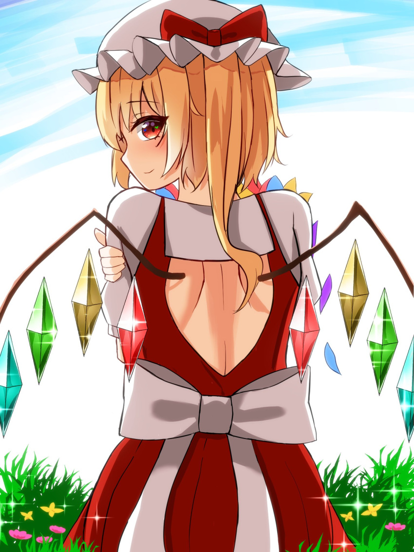 1girl blonde_hair blush bow crystal flandre_scarlet flower frilled_shirt frilled_shirt_collar frilled_skirt frilled_sleeves frills grass hat hat_ribbon highres kiui_(dagk8254) looking_at_viewer looking_back mob_cap red_eyes red_skirt red_vest ribbon shirt short_hair skirt smile solo touhou vest wings