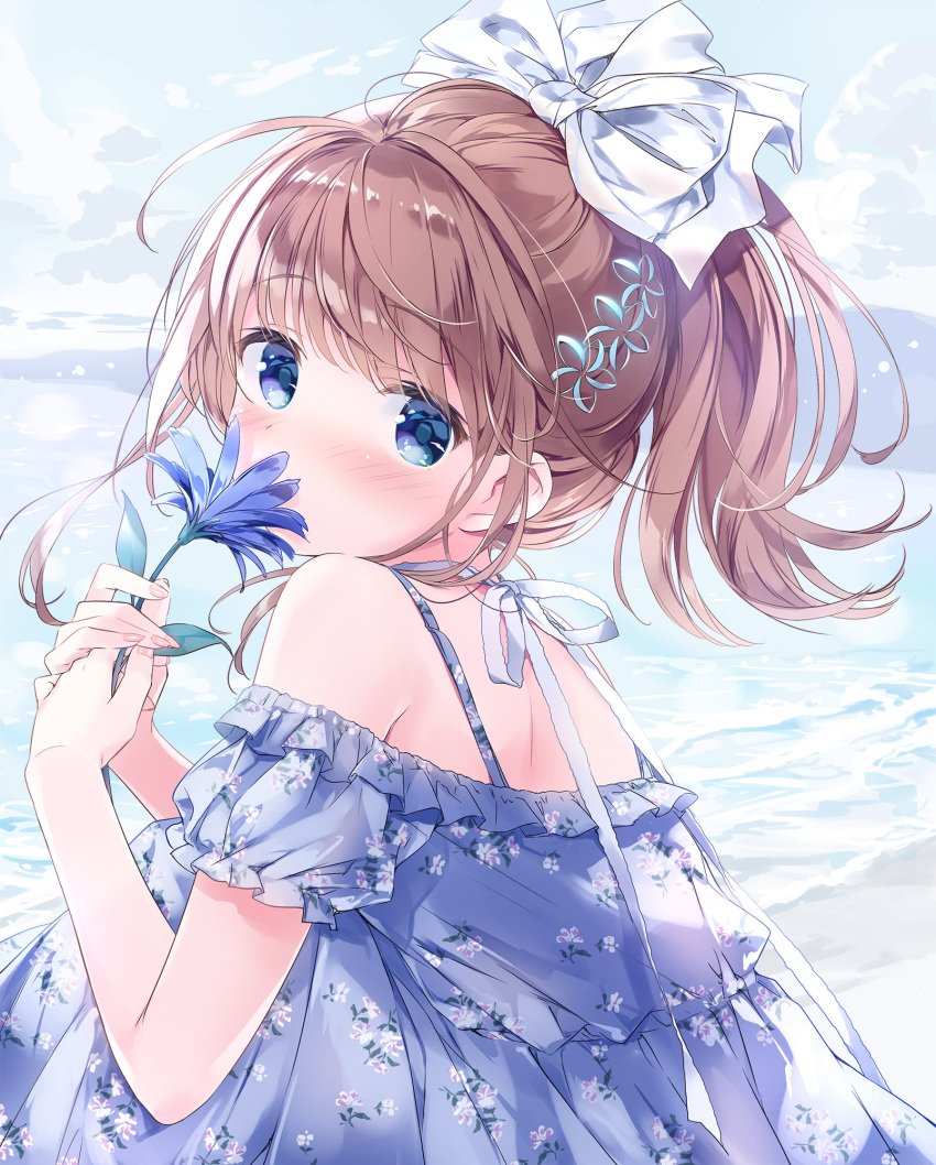 1girl bangs blue_dress blue_eyes blue_flower blush bow brown_hair commentary_request covered_mouth day dress eyebrows_visible_through_hair floral_print flower flower_over_mouth hair_bow hair_ornament hands_up highres holding holding_flower kimishima_ao looking_at_viewer momoi_saki off-shoulder_dress off_shoulder original outdoors ponytail print_dress puffy_short_sleeves puffy_sleeves revision short_sleeves sitting solo water waves white_bow