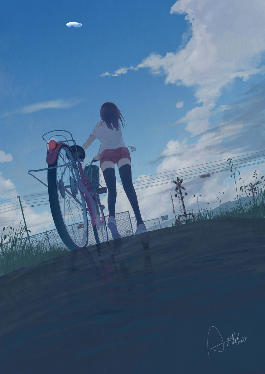 1girl aircraft ayataka bicycle black_legwear blue_sky clouds cloudy_sky day dirigible facing_away from_behind grass ground_vehicle highres medium_hair original outdoors power_lines railroad_signal red_shorts reflection scenery shirt shoes shorts signature sky solo standing thigh-highs white_shirt
