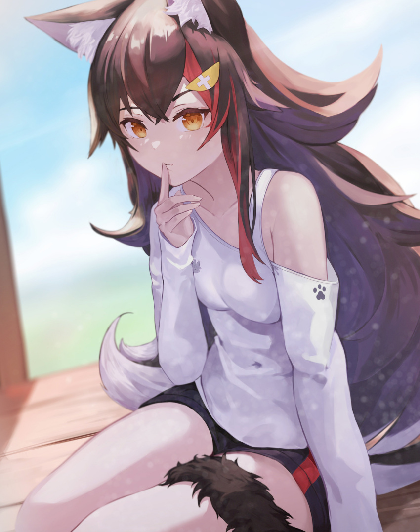 1girl absurdres animal_ear_fluff animal_ears black_hair clothing_cutout finger_to_mouth highres hololive multicolored_hair ookami_mio pencamp redhead shorts sitting streaked_hair tail tail_wrap virtual_youtuber white_hair wooden_floor