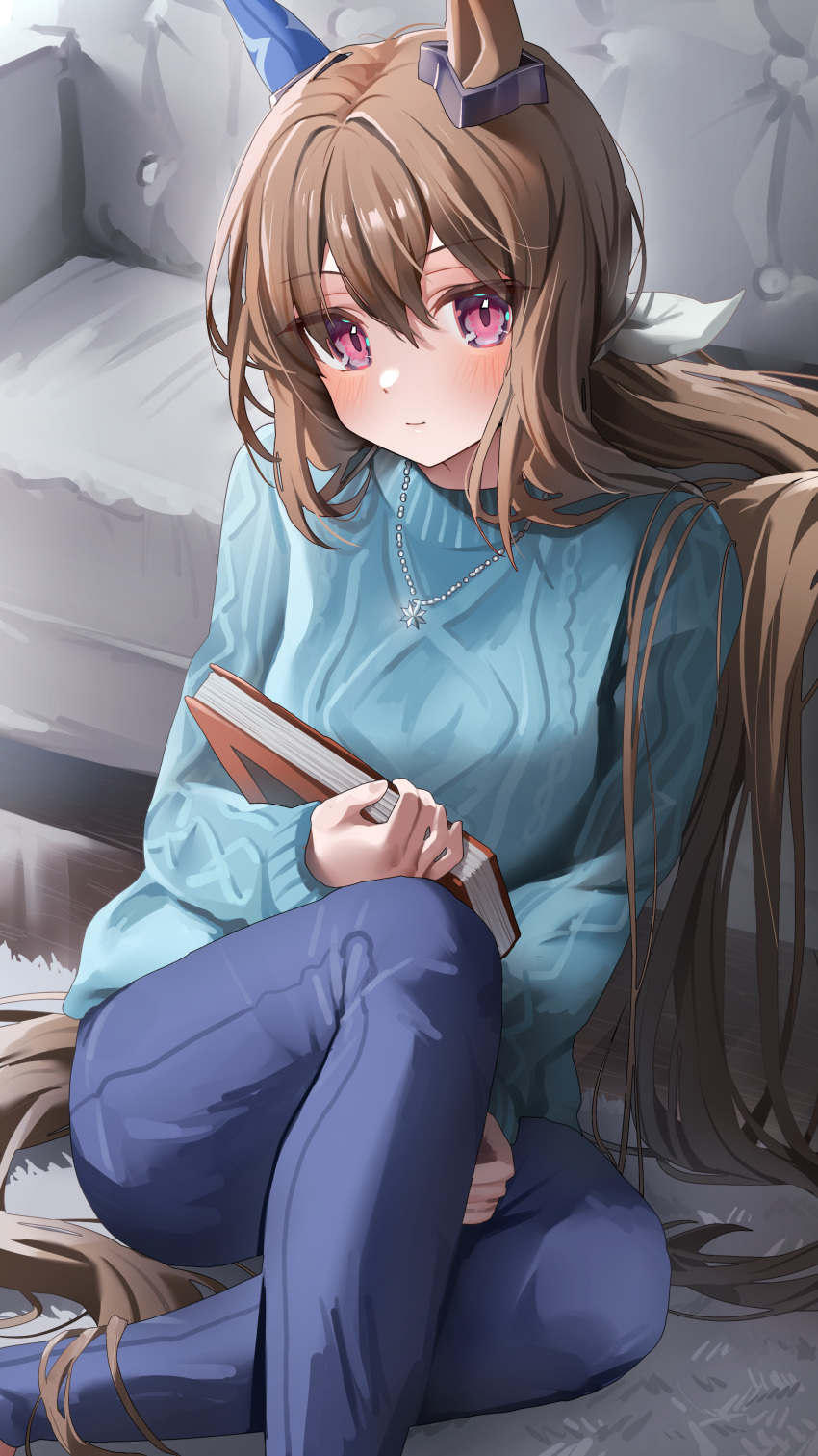 1girl absurdres admire_vega_(umamusume) animal_ears aran_sweater bangs blue_pants blue_sweater blush book brown_hair carpet closed_mouth couch eyebrows_visible_through_hair feet_out_of_frame highres holding holding_book horse_ears horse_girl horse_tail indoors jewelry knee_up long_hair looking_at_viewer necklace ningen_mame on_floor pants sitting smile solo sweater tail umamusume very_long_hair violet_eyes