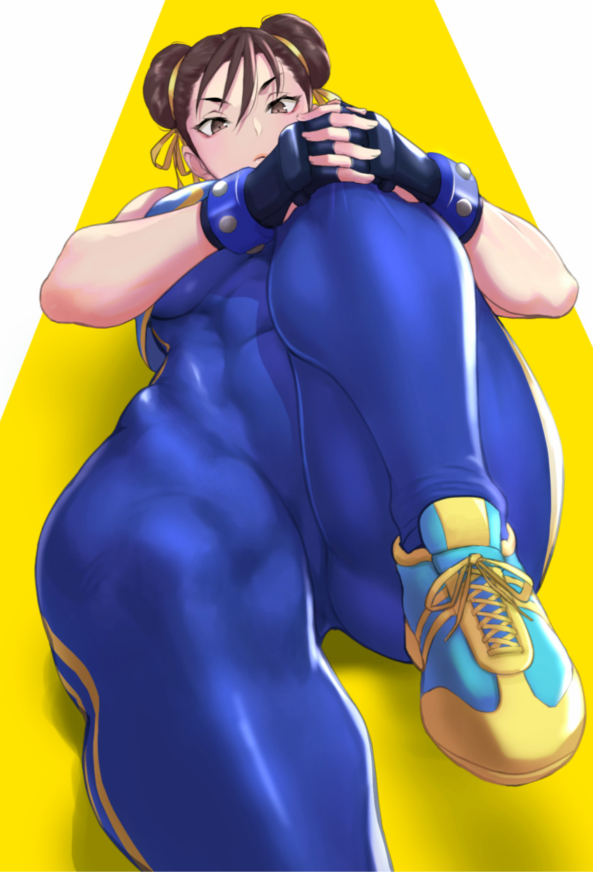 1girl abs anagumasan blue_bodysuit bodysuit breasts brown_eyes brown_hair chun-li covered_abs cross-laced_footwear double_bun exercise fingerless_gloves gloves hair_ribbon highres lying muscular muscular_female on_back ribbon skin_tight solo street_fighter street_fighter_zero_(series) stretch yellow_ribbon