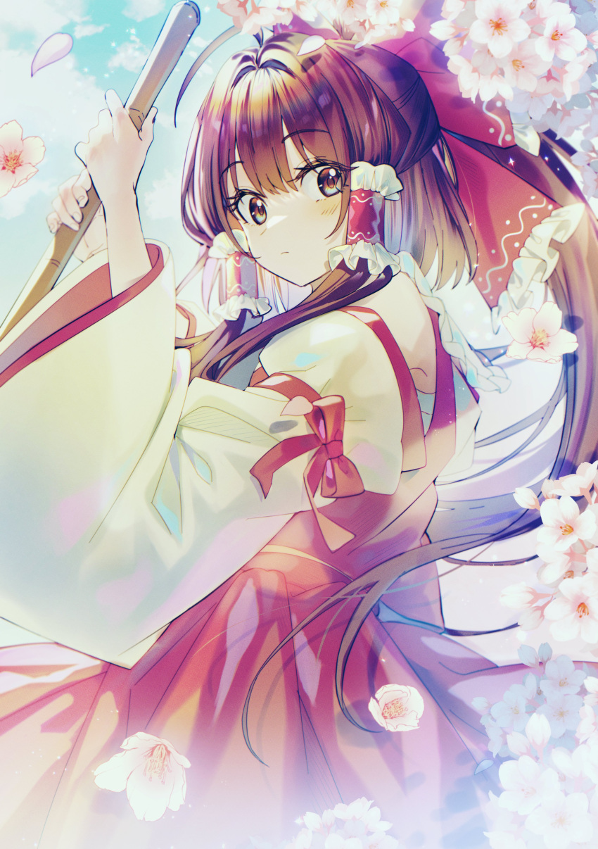 1girl absurdres bangs blush bow broom brown_eyes brown_hair chest_sarashi closed_mouth collared_vest commentary_request detached_sleeves eyebrows_visible_through_hair flower frilled_bow frills hair_bow hair_tubes hakurei_reimu here_(hr_rz_ggg) highres holding holding_broom long_hair long_sleeves looking_at_viewer outdoors petals ponytail red_bow red_ribbon red_skirt red_vest ribbon sarashi sidelocks skirt touhou vest white_flower wide_sleeves