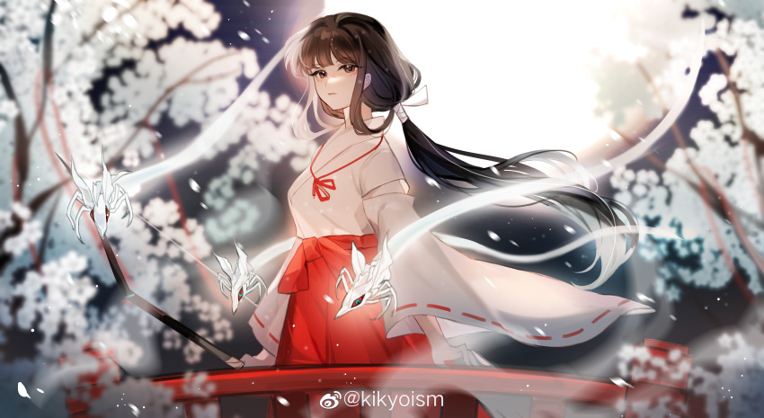 1girl absurdres black_hair blurry blurry_background bow bug expressionless highres inuyasha japanese_clothes kikyoism kikyou_(inuyasha) long_hair miko night petals ponytail solo spider very_long_hair white_tree wind