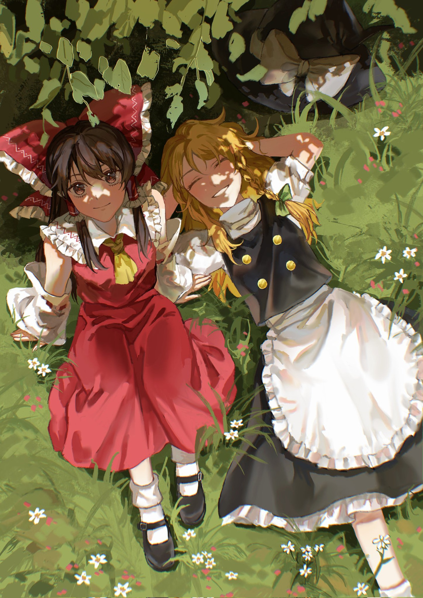 2girls aihara-rina apron ascot bangs black_headwear black_skirt black_vest blonde_hair blush bow braid brown_hair buttons closed_eyes closed_mouth commentary_request detached_sleeves double-breasted frilled_apron frilled_bow frilled_hair_tubes frills grin hair_bow hair_tubes hakurei_reimu hat highres kirisame_marisa long_hair long_sleeves looking_at_viewer lying mary_janes multiple_girls no_hat no_headwear on_back open_mouth outdoors red_bow red_skirt red_vest shirt shoes single_braid skirt smile socks touhou tree vest waist_apron white_apron white_legwear white_shirt witch_hat yellow_ascot