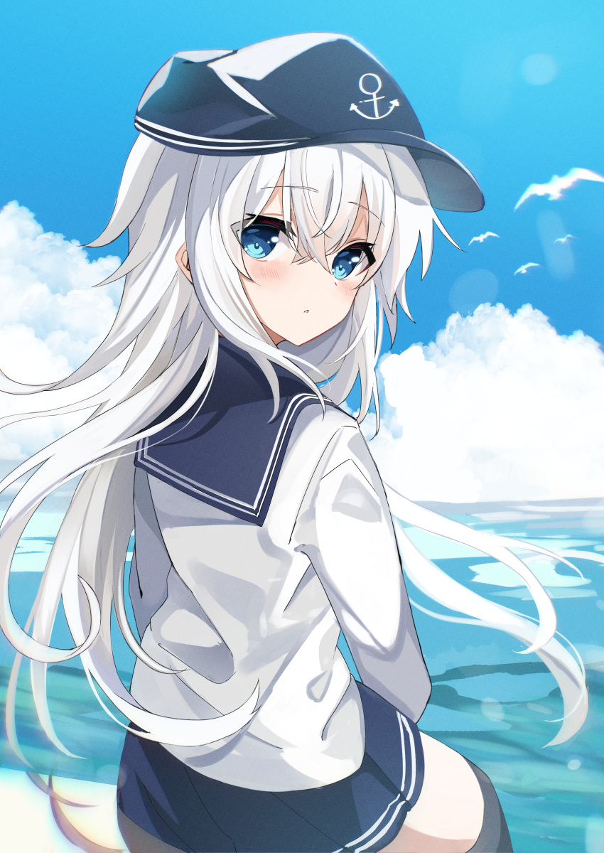 1girl absurdres anchor_symbol animal bird black_headwear black_legwear black_skirt blue_eyes blush clouds cloudy_sky day eyebrows_visible_through_hair fathom flat_cap hair_between_eyes hat hibiki_(kancolle) highres kantai_collection long_hair long_sleeves ocean parted_lips pleated_skirt school_uniform seagull serafuku silver_hair sitting skirt sky solo thigh-highs