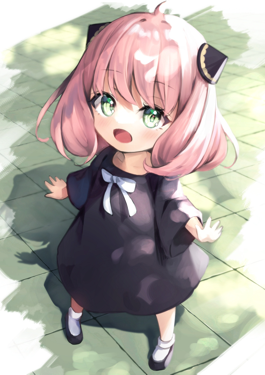 1girl :d absurdres ahoge anya_(spy_x_family) bangs black_dress black_footwear blush child dot_nose dress eyebrows_visible_through_hair green_eyes hane_yuki highres horn_ornament horns looking_at_viewer medium_hair open_hands open_mouth outstretched_arms pink_hair shoes smile socks solo spy_x_family swept_bangs tile_floor tiles toddler