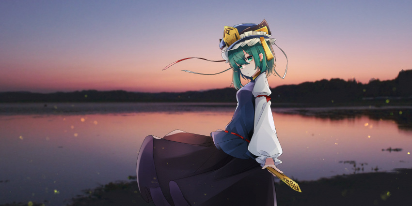 1girl absurdres asymmetrical_hair balance_scale bangs black_skirt blue_headwear blue_vest frilled_hat frills gradient_sky green_eyes green_hair gunsou1350 hat highres holding long_sleeves looking_at_viewer outdoors rod_of_remorse shiki_eiki short_hair skirt sky solo standing touhou vest weighing_scale