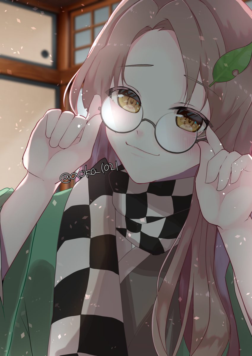 1girl aoko_(myut7287) artist_name bangs blush brown_eyes brown_hair checkered_clothes checkered_scarf closed_mouth futatsuiwa_mamizou glasses green_kimono highres indoors japanese_clothes kimono leaf leaf_on_head long_hair long_sleeves looking_at_viewer scarf smile solo touhou