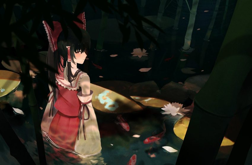 1girl b_(bbm) bamboo bangs bare_shoulders black_hair blush bow closed_mouth collared_dress detached_sleeves dress eyebrows_visible_through_hair flower frills from_behind grey_flower hair_between_eyes hakurei_reimu lake leaf light lily_(flower) long_hair long_sleeves looking_at_viewer looking_back ponytail red_bow red_dress red_eyes red_ribbon reflection ribbon ribbon-trimmed_sleeves ribbon_trim scenery shadow solo standing touhou water wide_sleeves