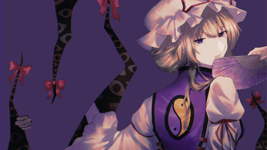 1girl absurdres arm_ribbon blonde_hair bow commentary eyebrows_visible_through_hair gap_(touhou) hand_fan hat hat_ribbon highres holding holding_fan long_sleeves looking_at_viewer mob_cap puffy_long_sleeves puffy_sleeves purple_background purple_tabard red_bow red_ribbon ribbon shirt short_hair smile solo somei_ooo touhou violet_eyes white_headwear white_shirt yakumo_yukari