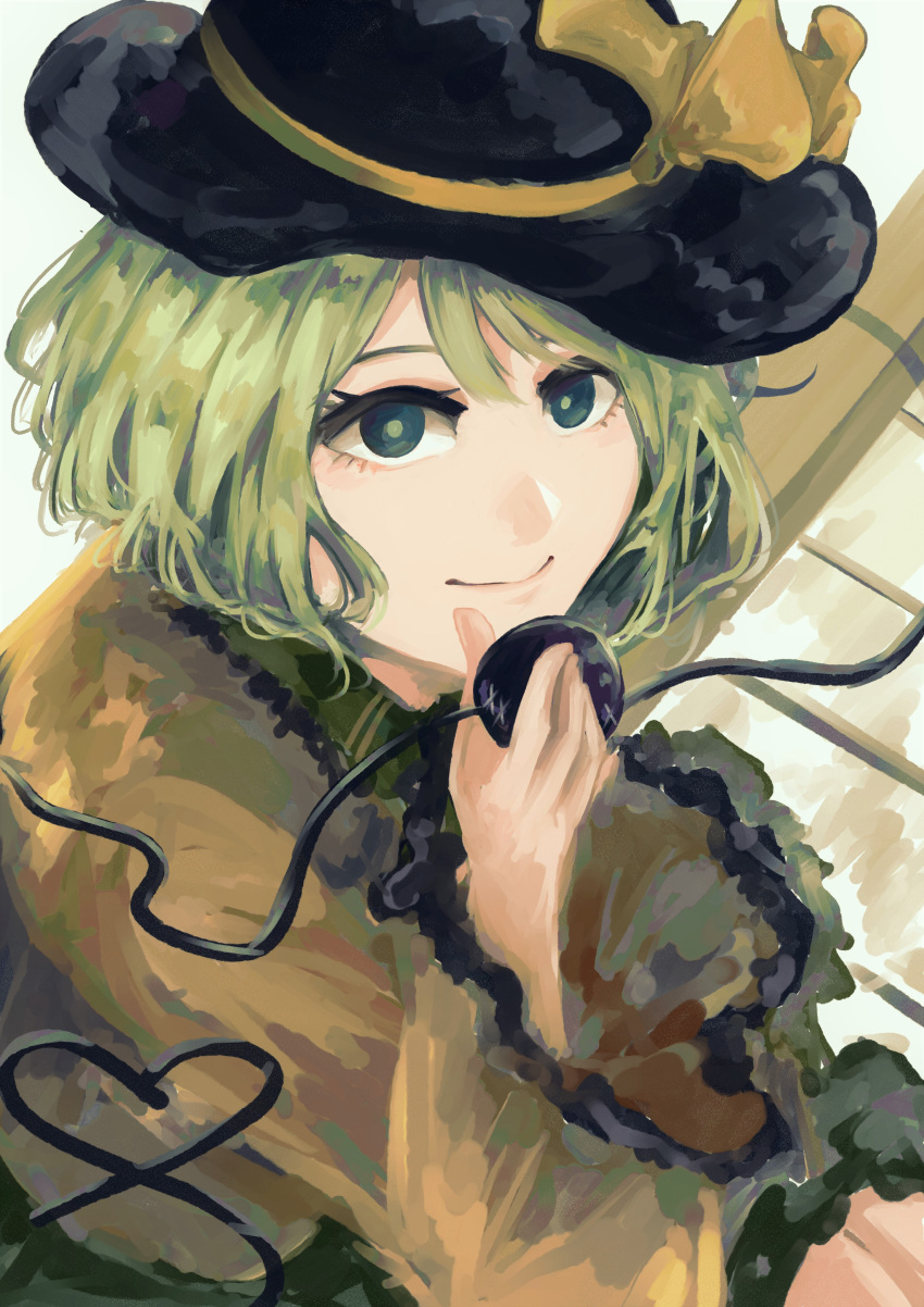 1girl absurdres black_headwear blouse closed_mouth commentary eyebrows_behind_hair frilled_shirt_collar frilled_sleeves frills green_eyes green_hair hair_between_eyes hand_up hat hat_ribbon heart heart_of_string highres holding komeiji_koishi long_sleeves looking_at_viewer ribbon shirt short_hair smile solo third_eye totopepe888 touhou upper_body wide_sleeves yellow_ribbon yellow_shirt