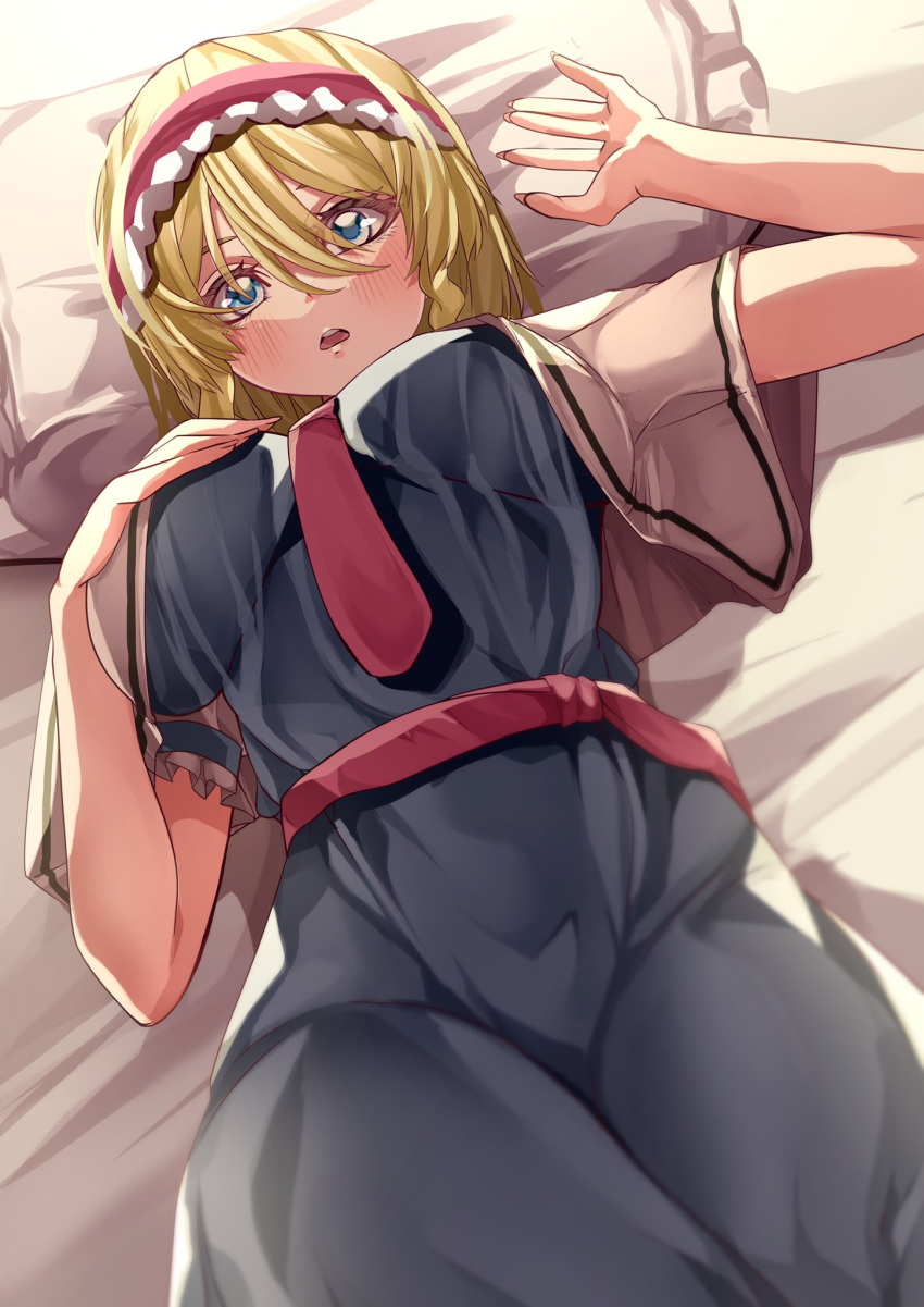 1girl :o alice_margatroid ascot bed blonde_hair blue_dress blue_eyes breasts capelet dress fingernails hairband highres large_breasts light_blush lolita_hairband lying maboroshi_mochi open_mouth pillow puffy_short_sleeves puffy_sleeves red_ascot red_hairband short_hair short_sleeves simple_background solo touhou white_background