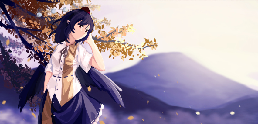 1girl arm_up bangs belt black_hair black_skirt blurry breasts buttons closed_mouth collared_shirt day depth_of_field expressionless falling_leaves feathered_wings frilled_skirt frills furahata_gen hand_in_own_hair hat highres landscape leaf medium_breasts mountain neck_ribbon no_lineart outdoors pointy_ears pom_pom_(clothes) ribbon scenery shameimaru_aya shirt short_sleeves skirt solo tengu tokin_hat touhou tree two-tone_shirt two-tone_skirt wind wings