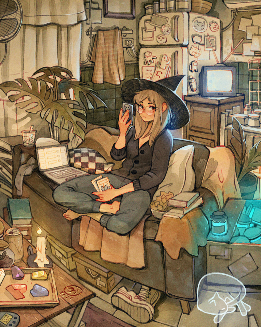 1girl black_headwear black_sweater brown_hair candle card computer couch glasses hat highres holding holding_card indoors laptop long_hair long_sleeves looking_at_viewer original refrigerator rimless_eyewear round_eyewear simz sitting solo sweater tarot television witch_hat