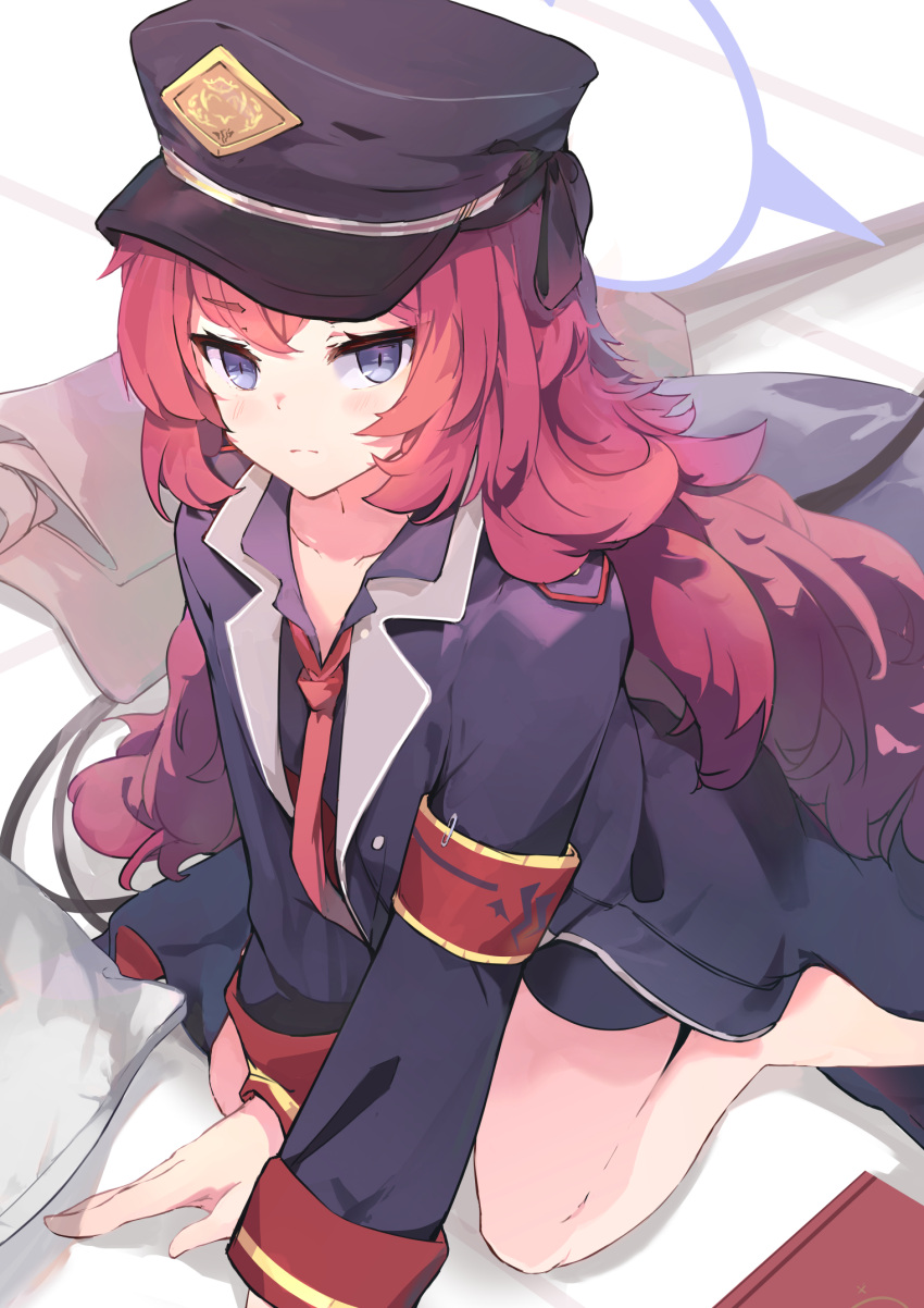 1girl annoyed arm_support armband bare_legs black_headwear black_jacket blue_archive commentary feet_out_of_frame grey_eyes halo hat highres iroha_(blue_archive) jacket kneeling koomoi long_hair long_sleeves looking_at_viewer military military_uniform necktie peaked_cap pillow red_necktie redhead safety_pin sidelocks solo tile_floor tiles uniform