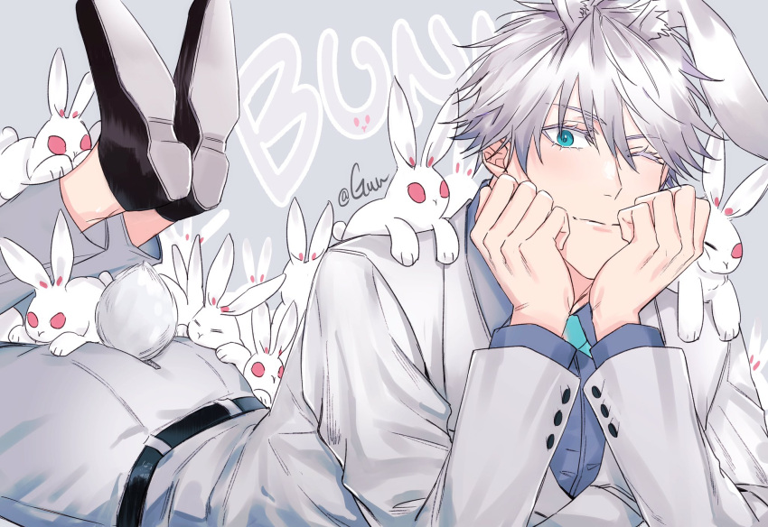 1boy animal animal_ears ass_zipper bangs belt blue_bow blue_bowtie blue_eyes blue_shirt bow bowtie closed_mouth collared_shirt commentary_request english_text gojou_satoru guuchun hair_between_eyes hands_on_own_cheek hands_on_own_face head_rest highres jacket jujutsu_kaisen long_sleeves looking_at_viewer lying male_focus on_stomach one_eye_closed pants rabbit rabbit_ears rabbit_tail shirt shoes short_hair smile solo tail the_pose too_many too_many_rabbits white_hair white_jacket white_pants zipper