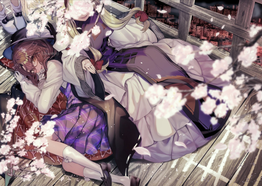 3girls black_headwear bow brown_eyes brown_hair cherry_blossoms cityscape doremy_sweet foot_out_of_frame from_above hat hat_bow highres ishikawa_sparerib long_sleeves looking_at_viewer low_twintails lying multiple_girls on_side open_mouth outdoors plaid purple_vest shirt shoes short_hair skirt smile socks tabard touhou twintails usami_sumireko vest white_legwear white_shirt wide_sleeves yakumo_yukari