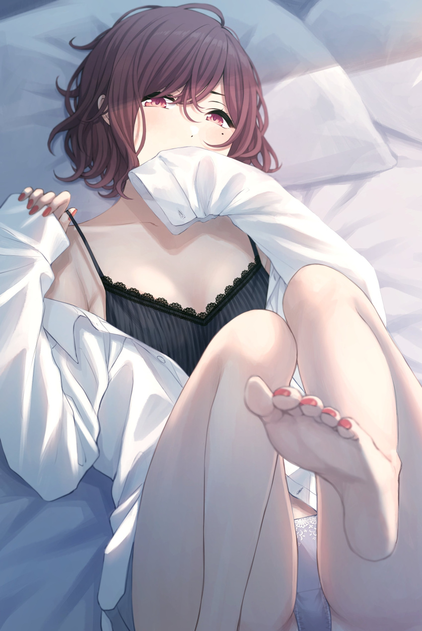 1girl absurdres ae_iueo bed_sheet black_camisole borrowed_garments camisole collarbone covered_mouth grey_panties highres higuchi_madoka idolmaster idolmaster_shiny_colors leg_up looking_at_viewer lying mole mole_under_eye nail_polish on_back on_bed oversized_clothes oversized_shirt panties red_eyes redhead shirt sleeves_past_wrists solo underwear white_shirt