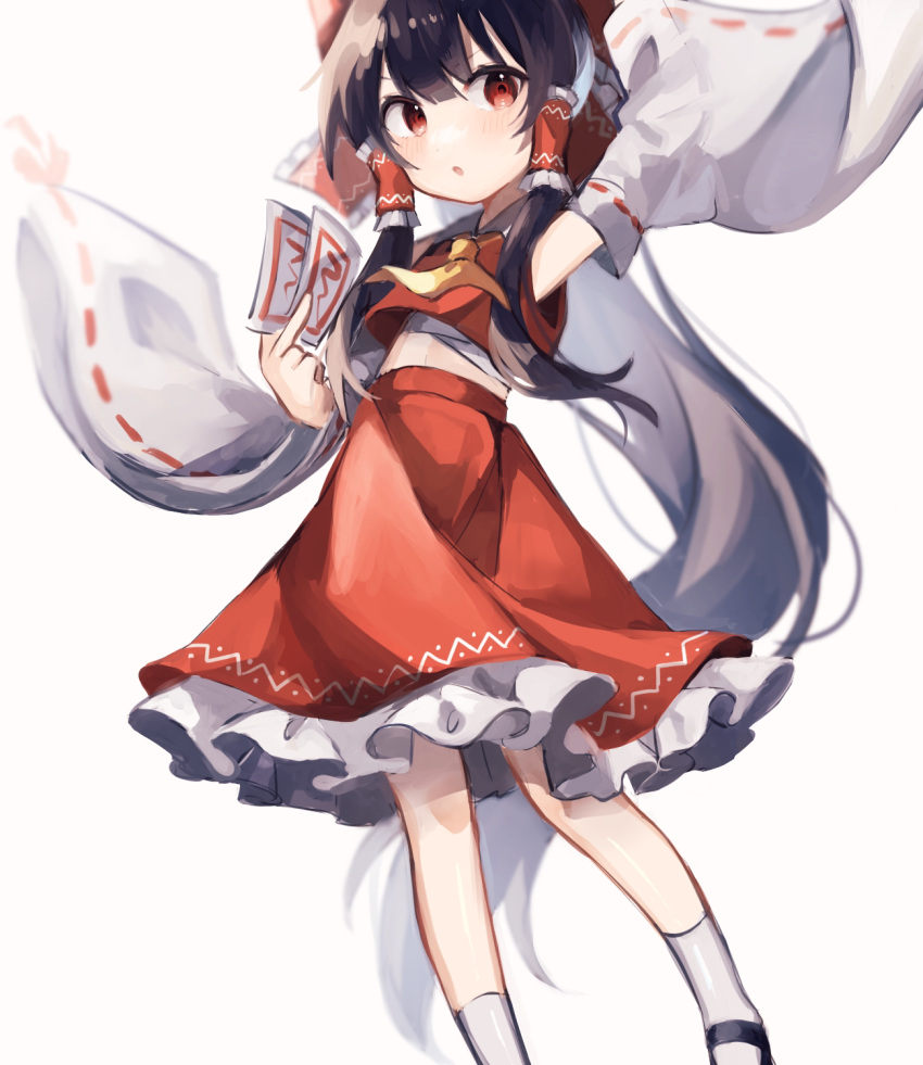 1girl arm_up armpits ascot black_hair blush bow chicachang detached_sleeves frills full_body grey_background hair_bow hair_tubes hakurei_reimu highres holding long_hair long_sleeves looking_at_viewer mary_janes ofuda petticoat red_bow red_eyes red_skirt ribbon-trimmed_sleeves ribbon_trim shoes skirt skirt_set socks solo standing touhou white_legwear wide_sleeves