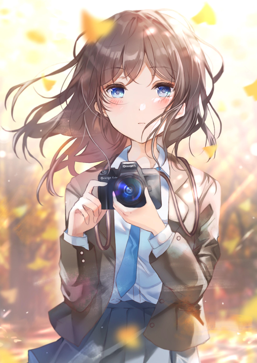 1girl absurdres bangs black_skirt blazer blue_eyes blue_necktie blurry blurry_background blush brown_hair brown_jacket camera camera_around_neck collared_shirt commentary depth_of_field english_commentary eyebrows_visible_through_hair ginkgo_leaf highres holding holding_camera jacket long_sleeves looking_at_viewer namamake necktie open_clothes open_jacket original parted_lips pleated_skirt shirt skirt solo white_shirt