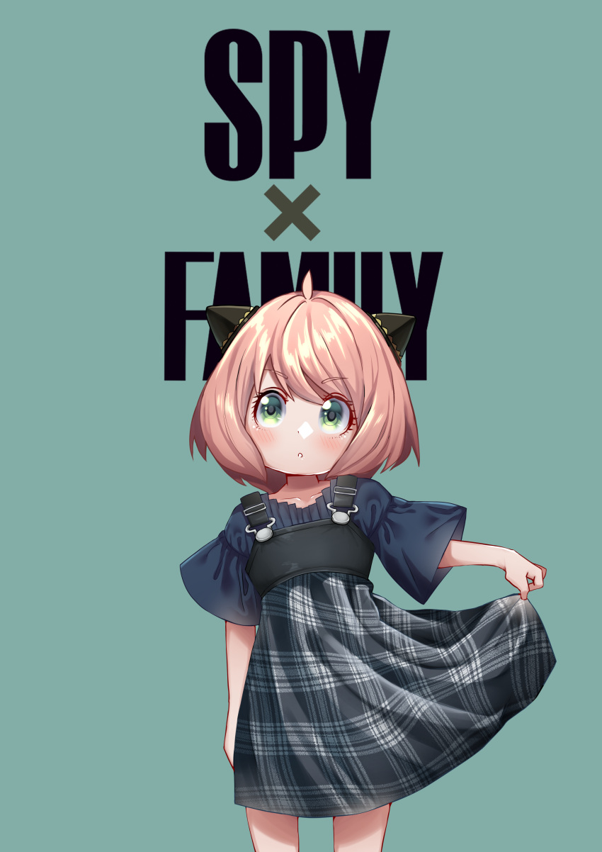 1girl :o absurdres ahoge anya_(spy_x_family) aqua_background arm_up bangs blue_shirt blush casual child copyright_name dress english_text fake_horns feet_out_of_frame frills green_background green_eyes hair_ornament highres horns izzu looking_at_viewer pinafore_dress pink_hair plaid plaid_dress shirt short_hair short_sleeves skirt_hold solo spy_x_family standing wide_sleeves