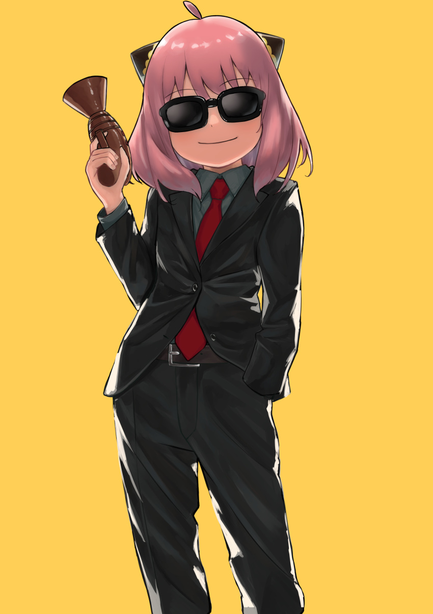 1girl absurdres ahoge anya_(spy_x_family) bangs black-framed_eyewear black_jacket black_pants blazer collared_shirt commentary_request contrapposto cowboy_shot formal grey_shirt hairpods hand_in_pocket hand_up highres holding holding_weapon jacket necktie pants pink_hair red_necktie shirt simple_background smile solo spy_x_family standing sunglasses weapon wing_collar yamada_no_orochi yellow_background