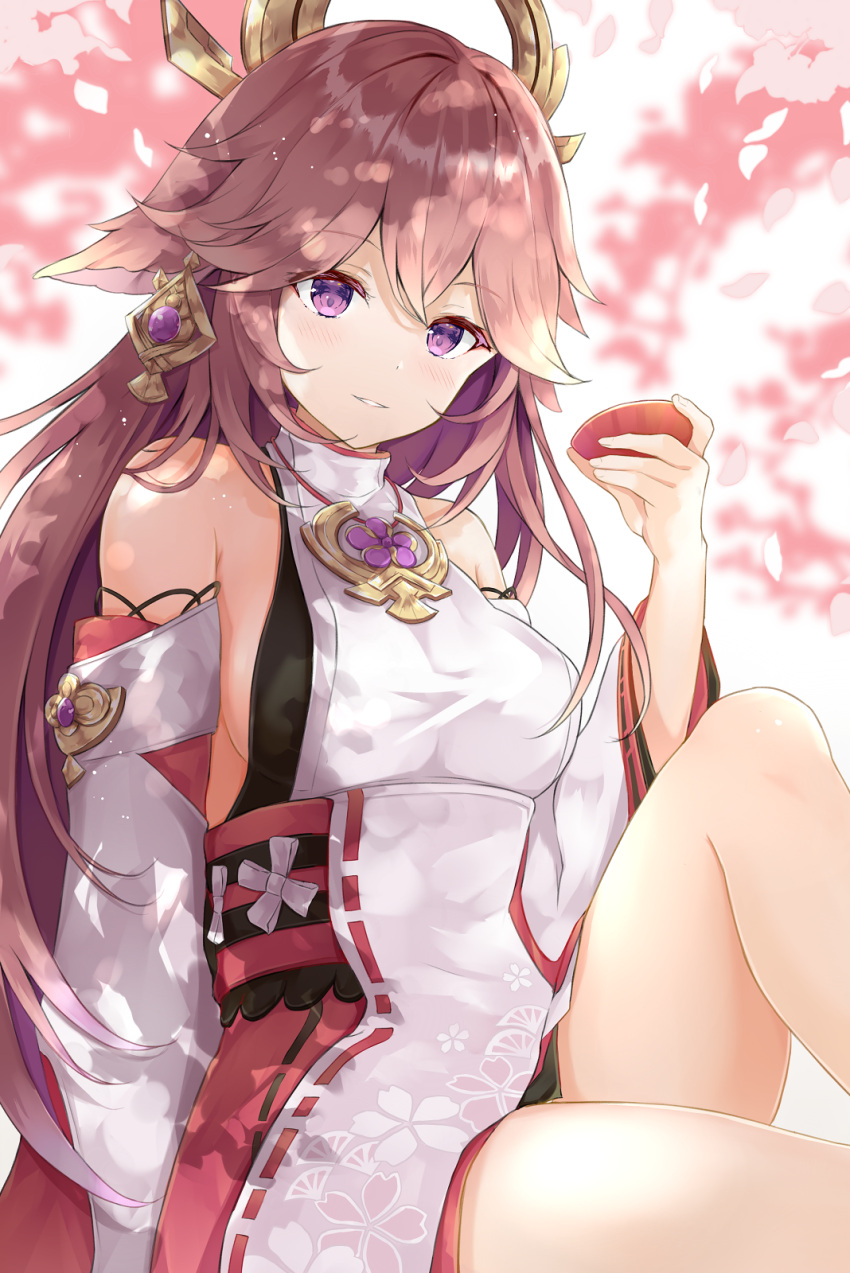 1girl animal_ears bangs blurry cherry_blossoms commentary_request cup depth_of_field detached_sleeves eyebrows_visible_through_hair fox_ears fox_girl genshin_impact hair_between_eyes hair_ornament highres holding holding_cup japanese_clothes knee_up long_hair long_sleeves looking_at_viewer nontraditional_miko petals pink_hair ribbon-trimmed_sleeves ribbon_trim sakazuki sidelocks sitting smile solo tree_shade user_pwth2328 violet_eyes wide_sleeves yae_miko