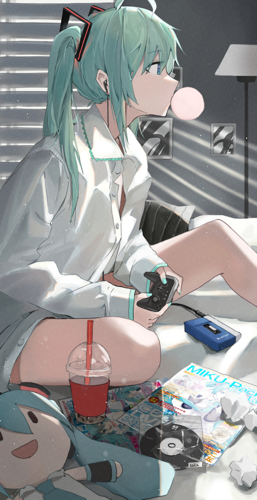 1girl absurdres ahoge aqua_hair aqua_nails bangs blinds blue_eyes bubble_blowing bubble_tea cassette_player cd character_doll chewing_gum commentary crumpled_paper cup disposable_cup dress_shirt drinking_straw hatsune_miku highres long_hair looking_to_the_side magazine_(object) naked_shirt painting_(object) playing_games shirt sidelocks sitting solo twintails very_long_hair vocaloid white_shirt yunkkker