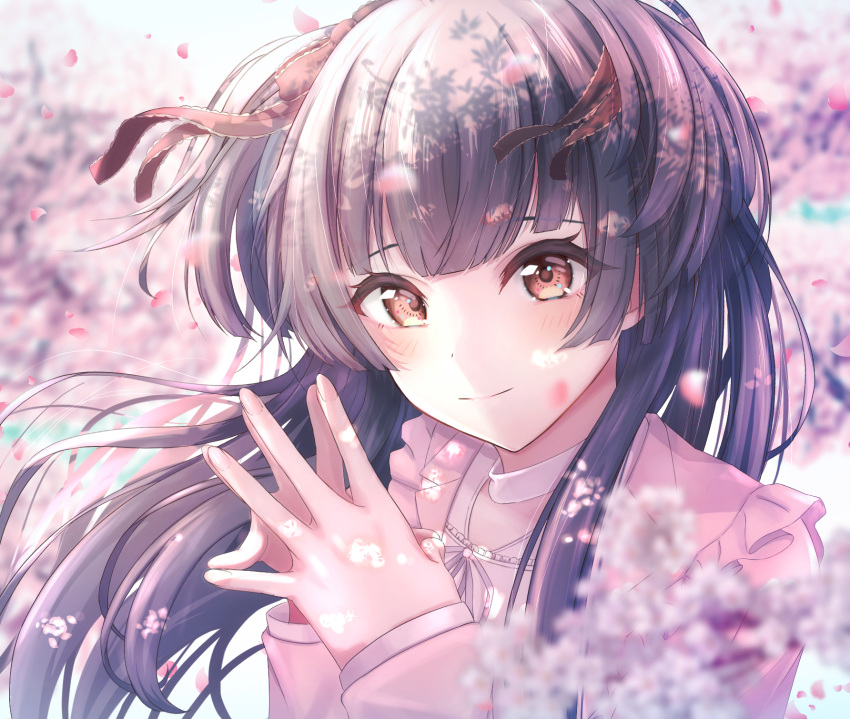 1girl bangs black_hair blunt_bangs blurry blurry_background blurry_foreground blush cherry_blossoms depth_of_field falling_petals floating_hair hair_ribbon highres idolmaster idolmaster_shiny_colors keshi_kado light_smile looking_at_viewer mayuzumi_fuyuko outdoors own_hands_together petals ribbon solo twintails upper_body