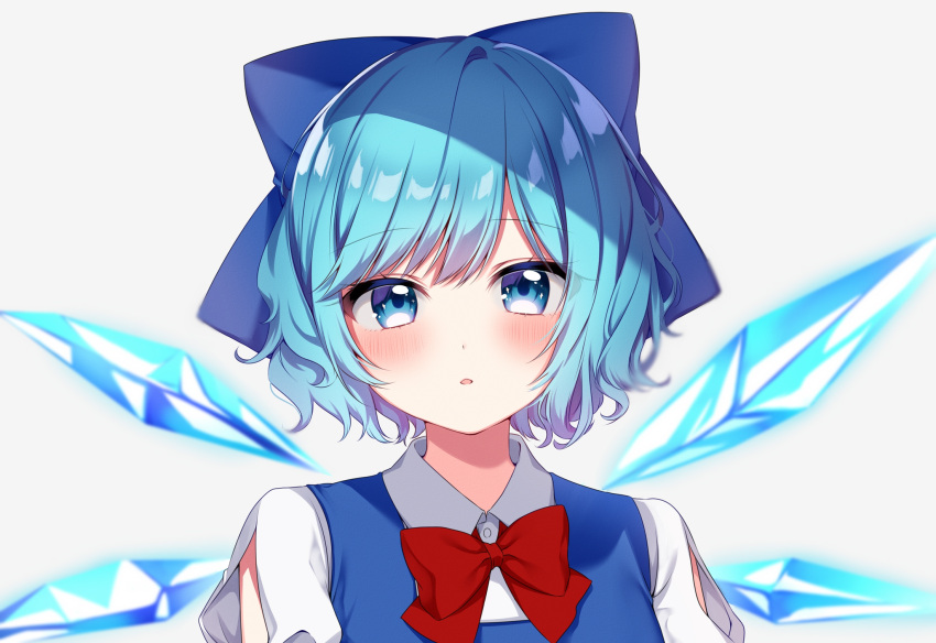 1girl bangs blue_bow blue_dress blue_eyes blue_hair blush bow bowtie breasts buttons cirno collared_shirt commentary_request dress eyebrows_visible_through_hair eyes_visible_through_hair grey_background hair_between_eyes highres ice ice_wings looking_at_viewer medium_breasts open_mouth puffy_short_sleeves puffy_sleeves red_bow red_bowtie shinonome_asu shirt short_hair short_sleeves simple_background solo touhou upper_body white_shirt wings