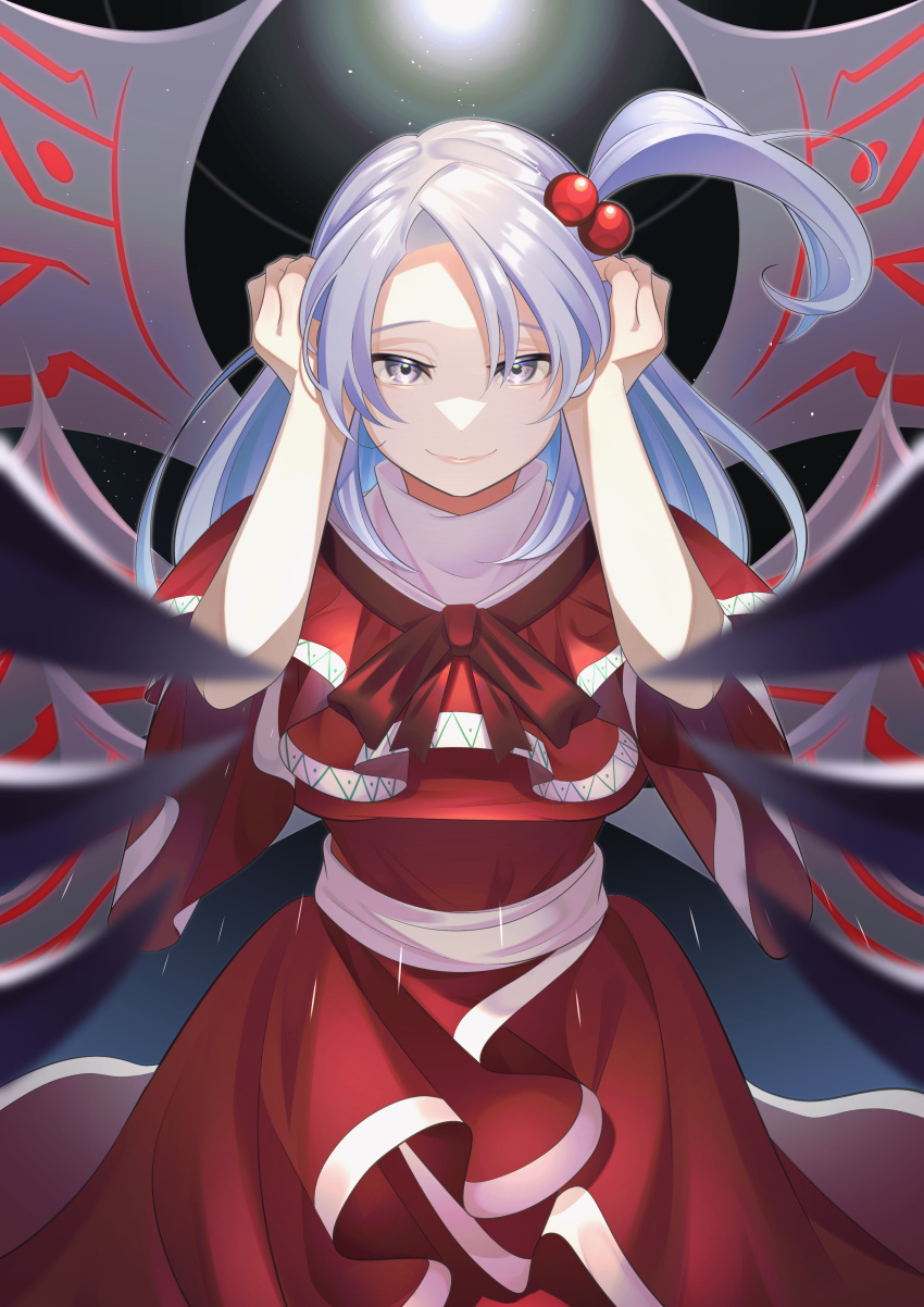 1girl absurdres blurry capelet cowboy_shot dark_background depth_of_field dress eyebrows_behind_hair grey_hair guumin hair_bobbles hair_ornament hands_up highres light light_particles long_hair looking_at_viewer one_side_up red_capelet red_dress shinki_(touhou) short_sleeves simple_background smile solo touhou touhou_(pc-98) wings