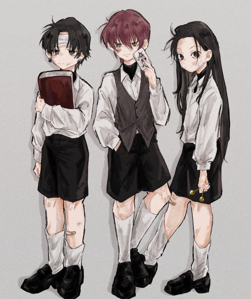 3boys arm_at_side bandaged_head bandages bandaid bandaid_on_cheek bandaid_on_face bandaid_on_knee bandaid_on_leg bangs between_fingers black_footwear black_hair black_shirt black_shorts book bruise bruise_on_face card child chrollo_lucilfer collared_shirt dirty dirty_clothes dirty_face dress_shirt drop_shadow earrings full_body grey_background grey_vest hair_slicked_back hand_in_pocket highres hisoka_morow holding holding_book holding_card holding_nail holding_weapon hunter_x_hunter illumi_zoldyck injury jewelry joker_(card) kicking kneehighs long_hair long_sleeves male_child male_focus messy_hair multiple_boys nail necomu parted_bangs playing_card redhead shirt shoes short_hair shorts simple_background standing turtleneck undershirt very_long_hair vest weapon white_shirt younger