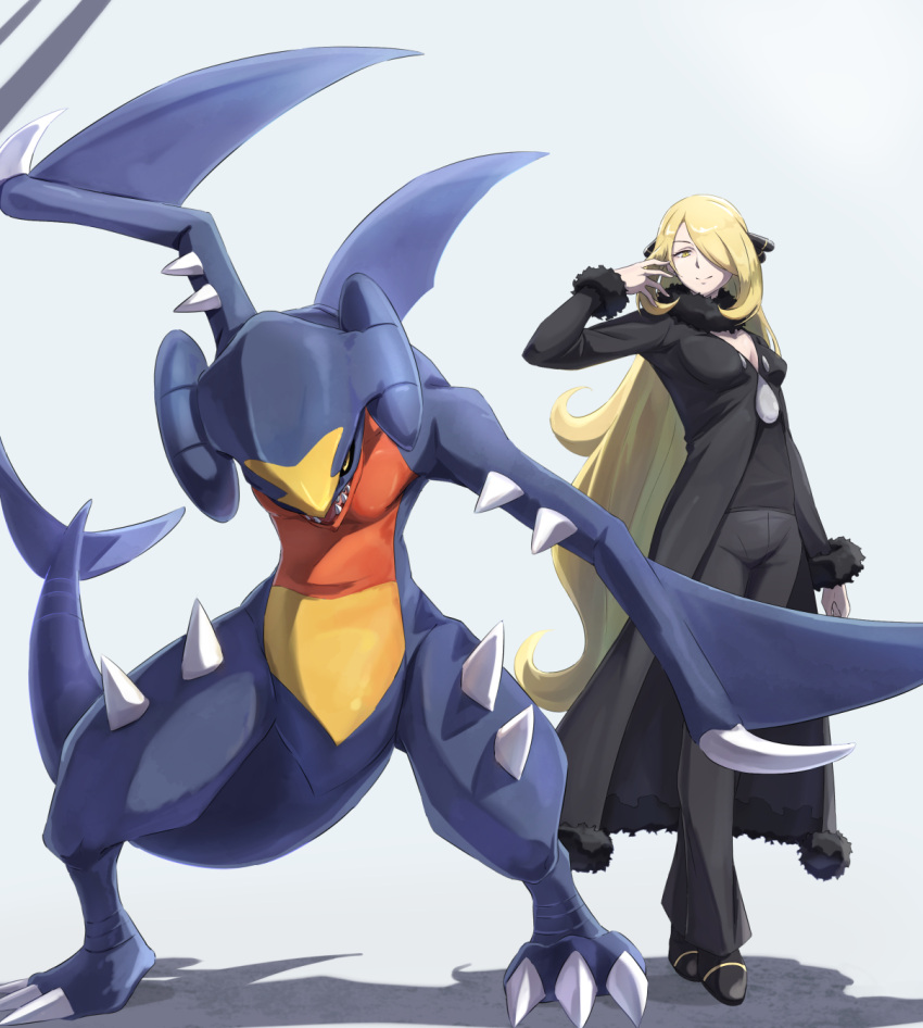 1girl black_coat black_pants black_shirt blonde_hair breasts closed_mouth coat cynthia_(pokemon) fish_tail full_body fur-trimmed_coat fur_collar fur_trim garchomp hair_ornament hair_over_one_eye hand_up highres itsudzumi long_hair looking_at_viewer medium_breasts pants pokemon pokemon_(creature) pokemon_(game) pokemon_dppt shadow shark_fin shark_tail sharp_teeth shirt smile spikes tail teeth very_long_hair yellow_eyes