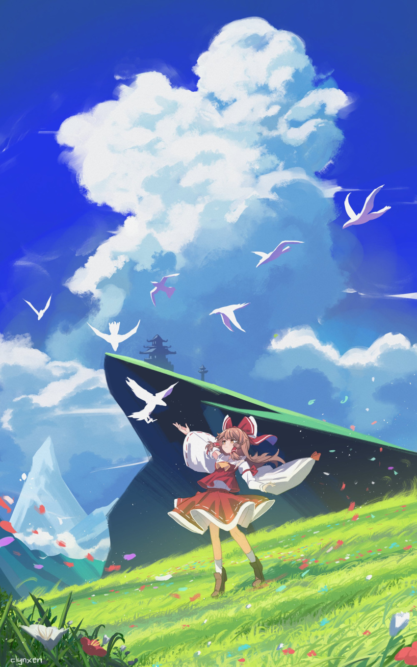 1girl absurdres arm_ribbon ascot bangs bird boots bow brown_eyes brown_footwear brown_hair cliff clouds cloudy_sky clynxen commentary day detached_sleeves field flower frilled_shirt_collar frills grass hair_bow hakurei_reimu hand_up highres hill long_hair outdoors outstretched_arm petals red_bow red_ribbon red_skirt red_vest ribbon ribbon-trimmed_skirt ribbon-trimmed_sleeves ribbon_trim shrine signature skirt sky smile socks solo standing touhou vest white_legwear white_sleeves wide_shot wide_sleeves yellow_ascot
