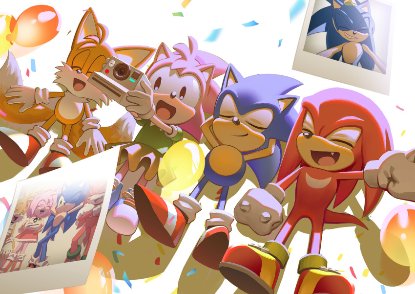 1girl 3boys :d absurdres amy_rose black_eyes camera closed_eyes fang highres hyeon_sonic knuckles_the_echidna multiple_boys open_mouth photo_(object) smile sonic_(series) sonic_the_hedgehog tails_(sonic)