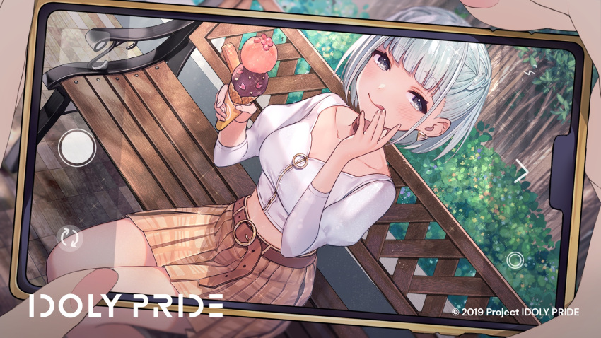 1girl bangs bench cellphone desk food grey_hair highres ice_cream ice_cream_cone idoly_pride kana_(idoly_pride) looking_at_viewer on_desk phone shirt sitting sitting_on_desk skirt smartphone smile solo tsunakawa