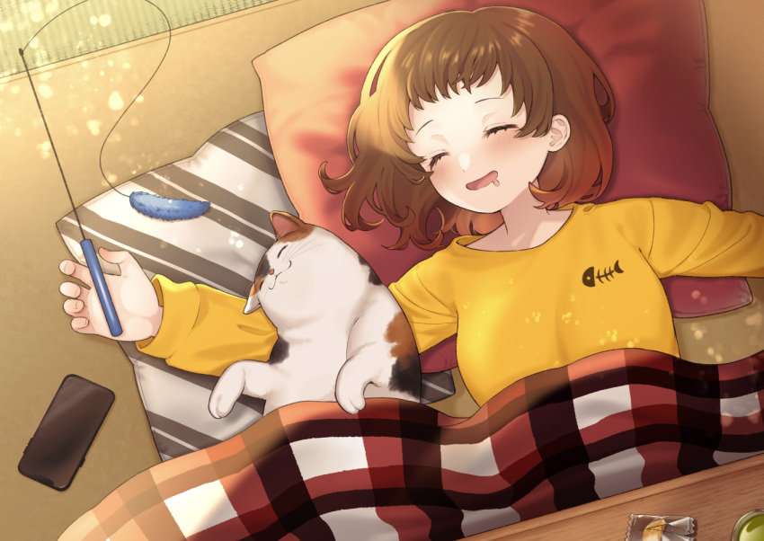 1girl amanatu-summer33 animal bangs blush brown_hair calico cat cat_teaser cellphone closed_eyes drooling fish_skeleton_print holding kotatsu light_particles long_sleeves lying on_back on_floor open_mouth original outstretched_arm phone pillow saliva short_hair sleeping smartphone smile solo table wrapper