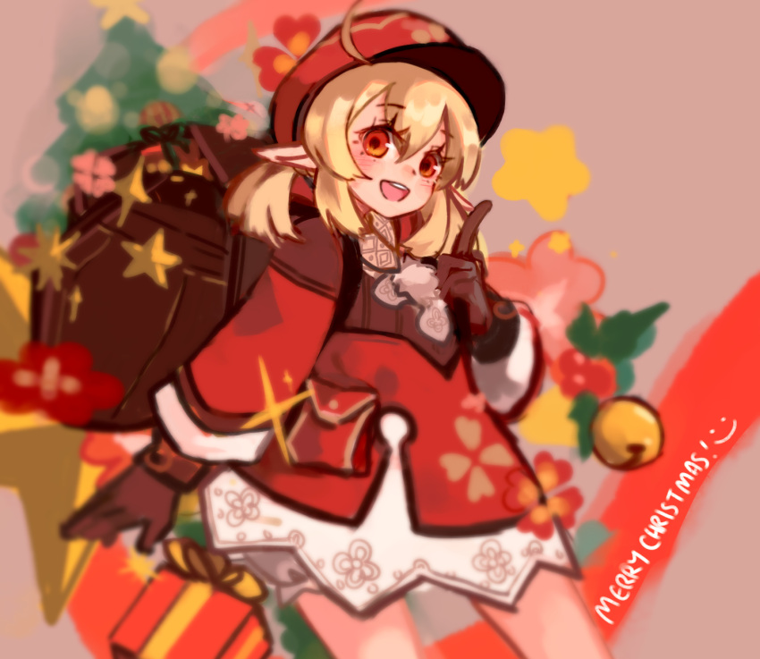 1girl :d ahoge backpack bag bangs bell blonde_hair bloomers blush brown_background brown_gloves cabbie_hat christmas christmas_tree dress genshin_impact gloves hair_between_eyes hand_up hat highres index_finger_raised jingle_bell klee_(genshin_impact) long_hair long_sleeves looking_at_viewer low_twintails merry_christmas pointy_ears red_dress red_eyes red_headwear smile solo star_(symbol) teeth twintails underwear upper_teeth white_bloomers zxny