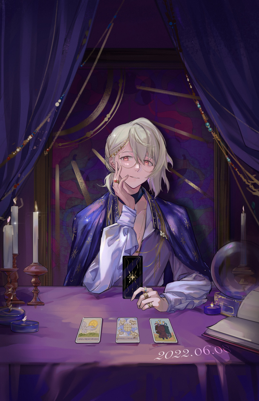 1boy absurdres ball bishounen blonde_hair candle candle_wax candlelight card curtains glasses highres idolish_7 jacket jewelry long_sleeves looking_at_viewer male_focus natsume_minami pingpingj puffy_sleeves red_eyes ring semi-transparent short_hair smile solo table tarot wax