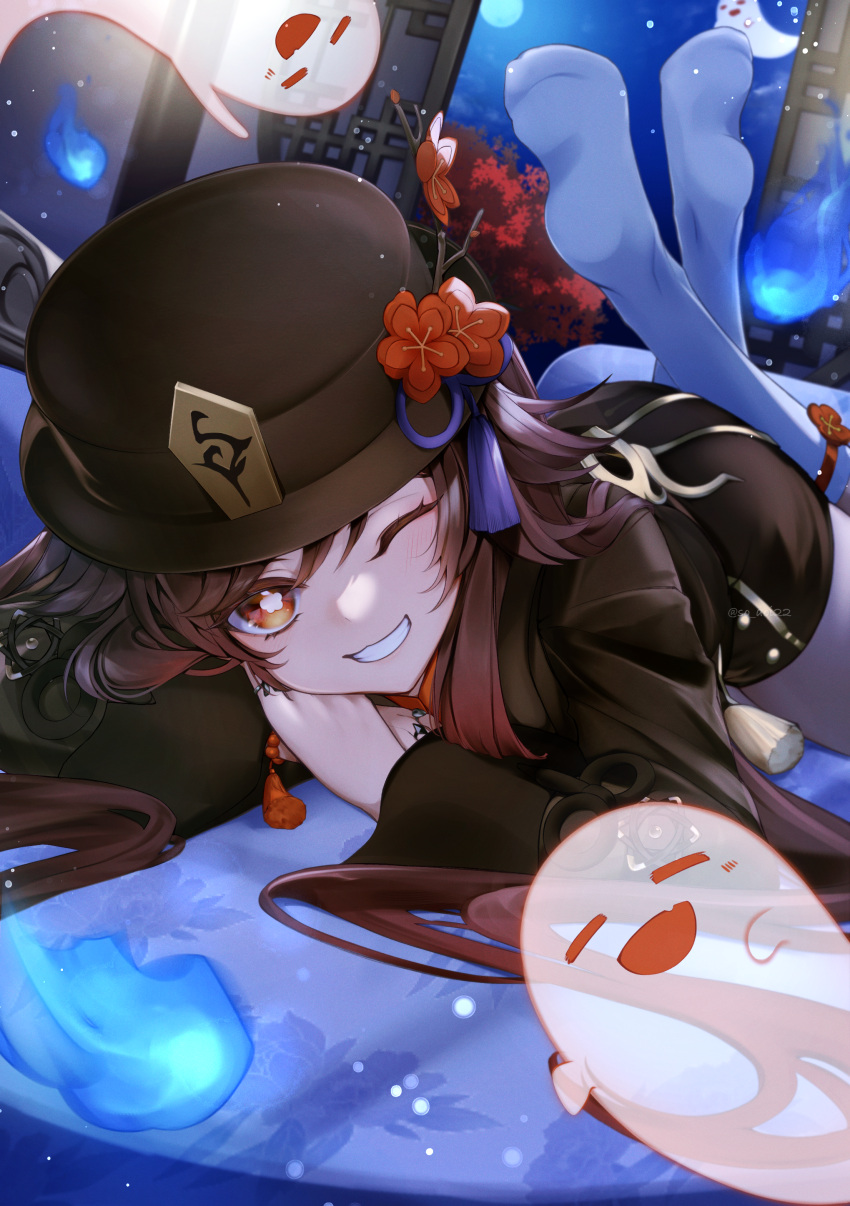 1girl absurdres asahi_(vjss4548) blue_fire blush brown_coat brown_hair coat fire flower flower-shaped_pupils genshin_impact ghost grin hat hat_flower highres hu_tao_(genshin_impact) jewelry legs_up long_hair looking_at_viewer lying on_stomach one_eye_closed plum_blossoms porkpie_hat red_eyes ring smile socks solo symbol-shaped_pupils tassel teeth twitter_username white_socks wide_sleeves