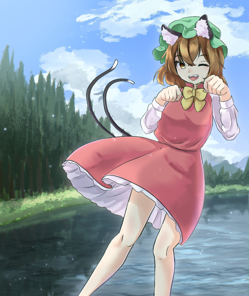 1girl bow bowtie brown_hair chen clouds dress grass green_hair hat highres kulukulu3333 long_sleeves mob_cap one_eye_closed open_mouth paw_pose red_dress scenery short_hair smile tail touhou tree water