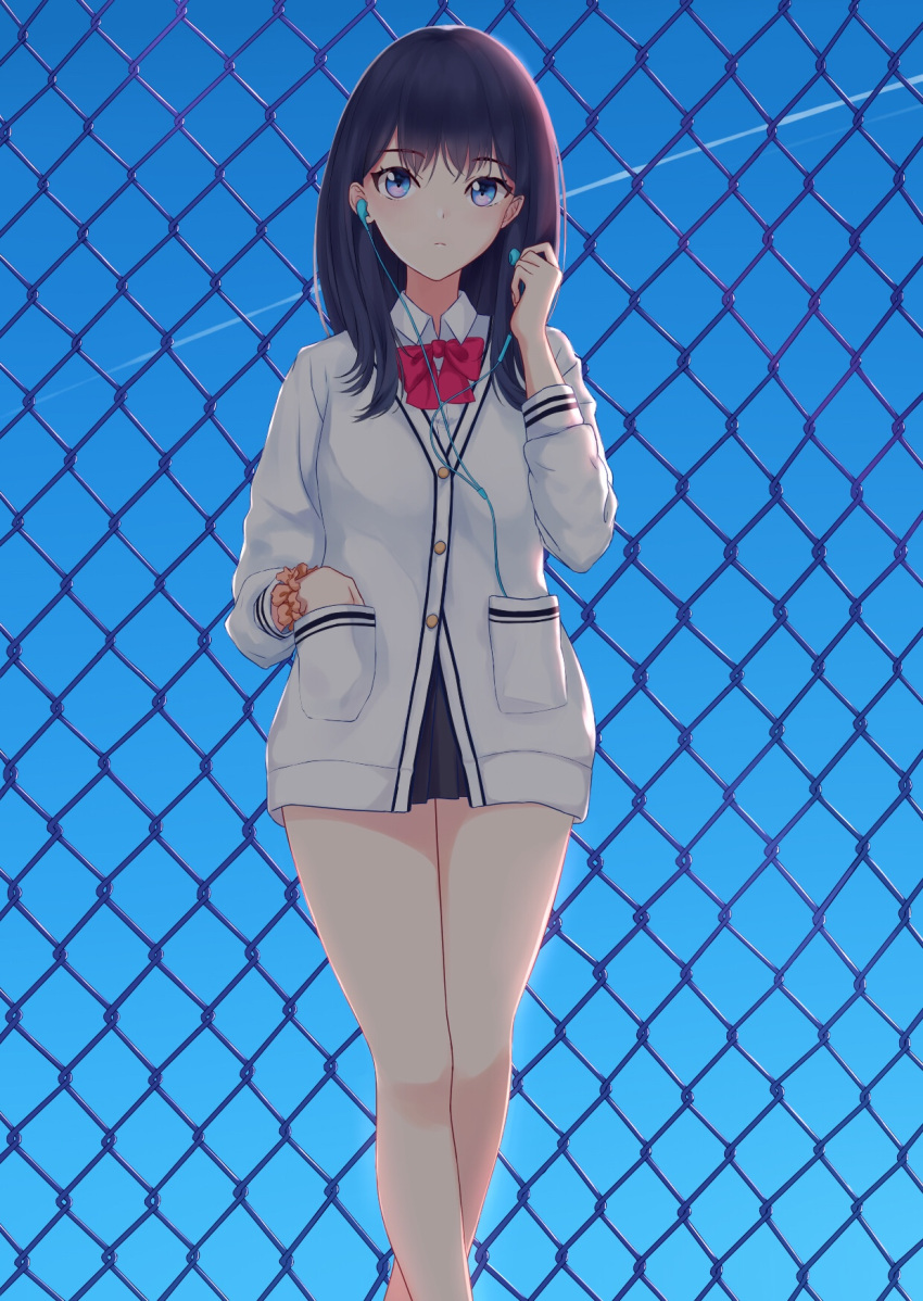 1girl bare_legs black_hair blue_eyes blue_sky bow bowtie chain-link_fence commentary contrail day earphones fence gridman_universe hand_in_pocket highres long_hair long_sleeves looking_at_viewer outdoors scrunchie shigatsu_(4gate) sky solo ssss.gridman standing takarada_rikka wrist_scrunchie