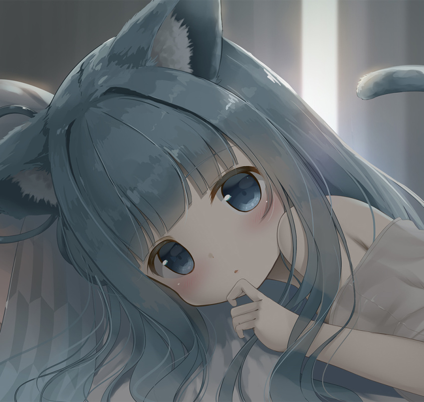 1girl animal_ear_fluff animal_ears bed blue_eyes blue_hair blush cat_ears cat_tail child close-up female_child hand_to_own_mouth indoors kotonoha_aoi long_hair looking_at_viewer lying on_stomach original psyche3313 ribbon shirt solo tail upper_body voiceroid white_shirt
