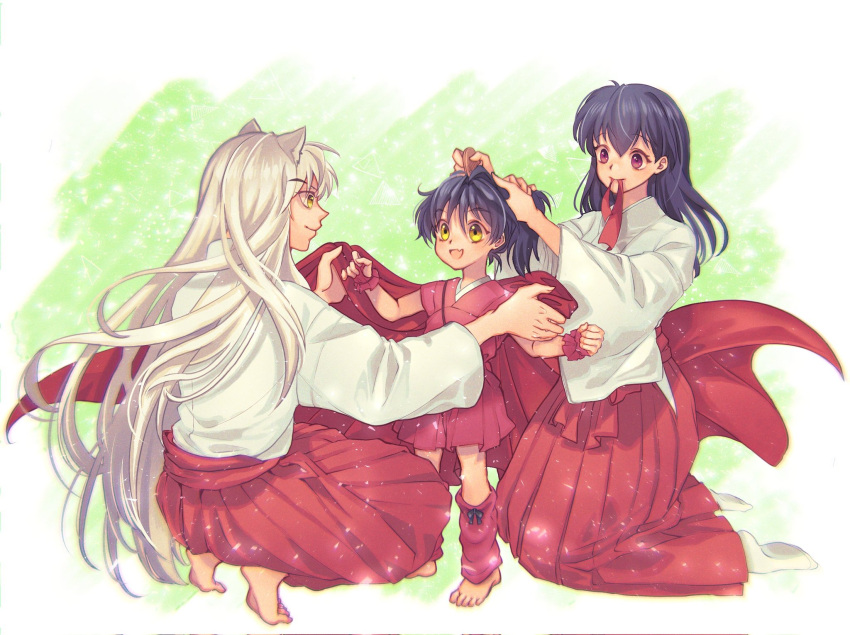 animal_ears barefoot black_hair brown_eyes dog_ears family father_and_daughter female_child full_body green_background hair_between_eyes hakama hand_in_another's_hair highres higurashi_kagome inuyasha inuyasha_(character) japanese_clothes kneeling leg_warmers long_hair makochan miko moroha mother_and_daughter mouth_hold open_mouth pants red_pants ribbon ribbon_in_mouth shirt smile socks squatting white_hair white_shirt yellow_eyes