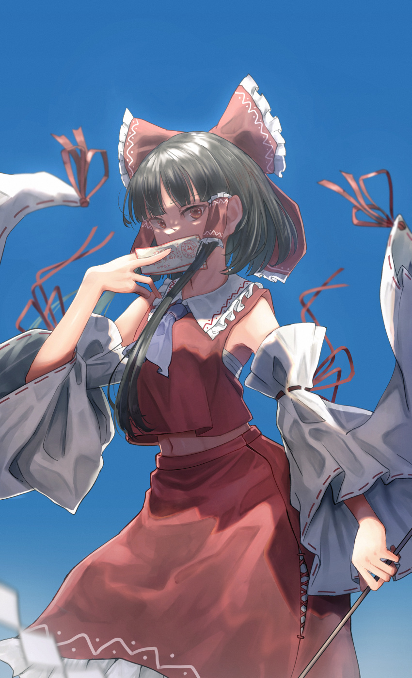 1girl aaaa_(yumx3575) absurdres ascot bandages bangs bare_shoulders blue_ascot blue_background bow breasts collared_shirt covering_mouth detached_sleeves frills gohei grey_hair hair_ornament hair_tubes hakurei_reimu hand_up highres long_sleeves looking_at_viewer medium_breasts navel ofuda red_bow red_eyes red_shirt red_skirt ribbon ribbon-trimmed_sleeves ribbon_trim sarashi shirt short_hair simple_background skirt solo standing touhou wide_sleeves