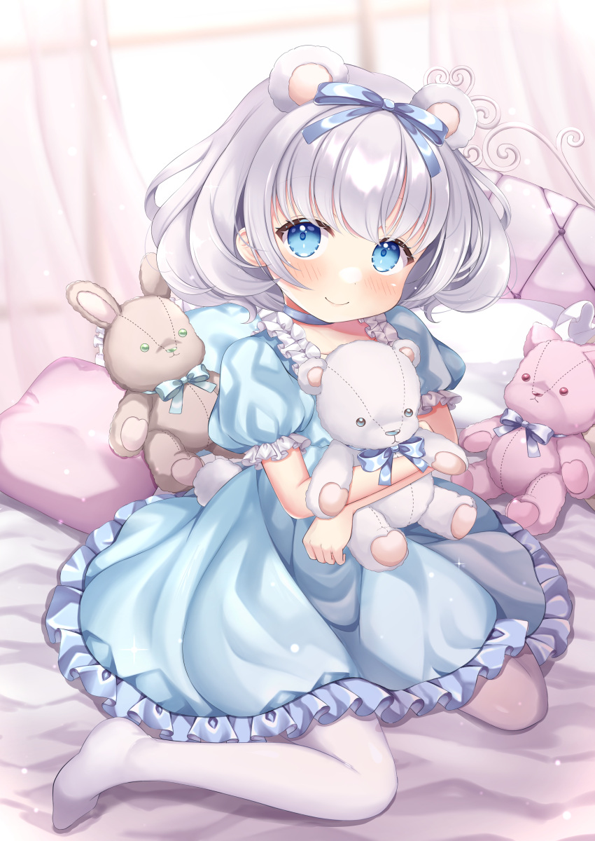 1girl absurdres animal_ears bear_ears bed blue_dress blue_eyes blue_ribbon blush dress frilled_dress frills grey_hair hair_ribbon hajime_yo highres holding holding_stuffed_toy looking_at_viewer on_bed original pantyhose pillow ribbon short_hair short_sleeves sitting smile solo stuffed_animal stuffed_bunny stuffed_toy teddy_bear wariza white_pantyhose